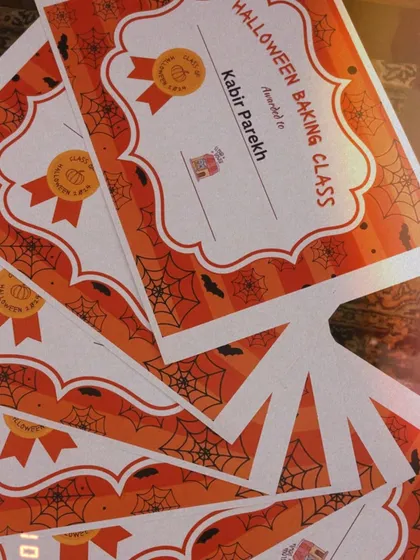 Official recognition for my little bakers. These "Halloween Baking Class" certificates are a fun takeaway for the kids to remember their spooky creations.