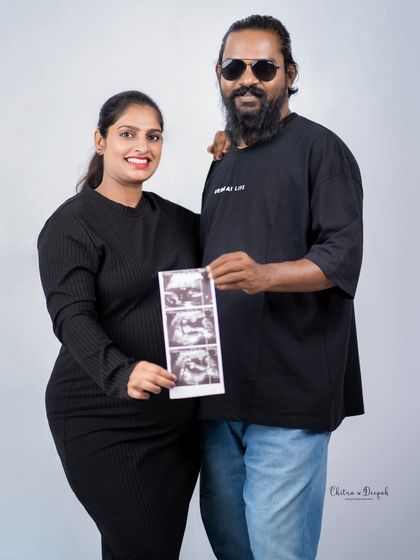 The first hello! Holding up the sonogram picture is a powerful and popular way to include your little one in the maternity photos.