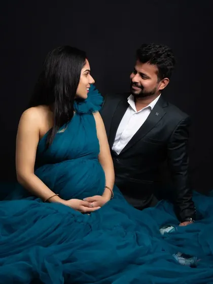 The look shared between two people in love is one of my favorite things to capture. Seated amidst the waves of her teal gown, this couple shares a moment of quiet conversation and excitement.