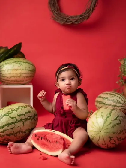 It's not a watermelon smash without a little taste test! These candid moments of babies exploring the props are what make each session so special and unique.