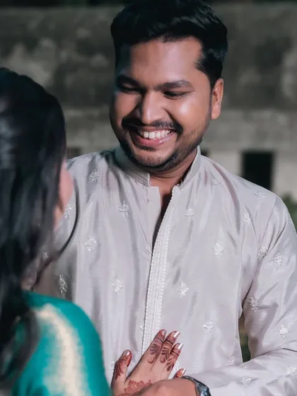 The groom's loving expression as he looks at his bride.