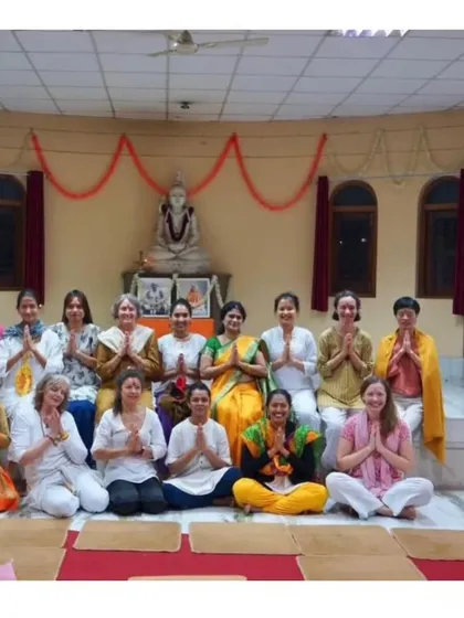 A group of dedicated students after a session at the ashram. You will find yourself part of a global spiritual family, connecting with like-minded individuals on the same path of self-discovery.