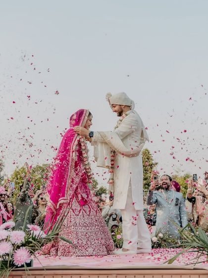When reality is better than your dreams, you know you've found your person. This moment from our Varmala (garland exchange) ceremony, surrounded by friends and family, felt absolutely magical.
