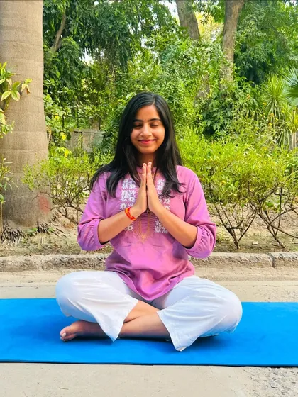 The body benefits from movement, and the mind benefits from stillness. A moment of peace in Padmasana (Lotus Pose) with Anjali Mudra (Prayer Hands).
