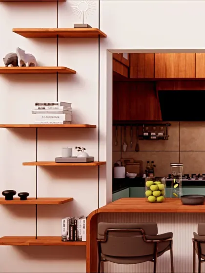 This shot highlights the connection between the kitchen, breakfast bar, and the decorative floating shelves in the living area, showcasing the integrated design of the open-plan space.