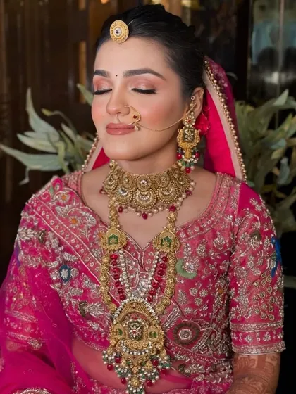 A close-up of the soft glam bridal makeup. You can see the subtle shimmer on the eyelids and the perfectly blended foundation that looks like second skin.