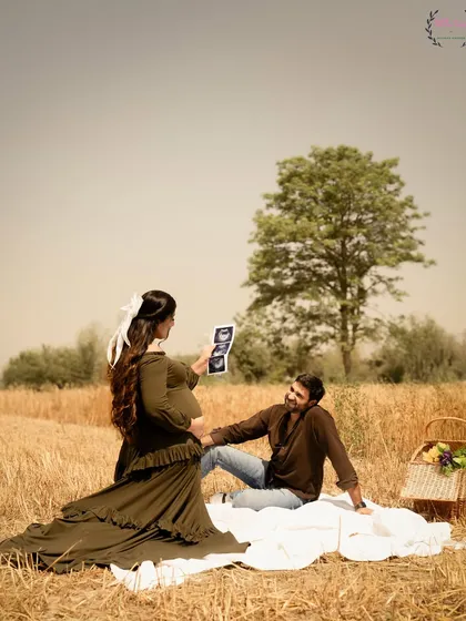 A lovely picnic setup for Shireen and Hasan's pregnancy announcement, sharing the ultrasound pictures in a relaxed, natural setting.