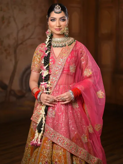 A beautiful portrait of our bride in her fairytale look. The makeup is a blend of tradition and elegance, with kohl-rimmed eyes and a flawless, dewy glow.