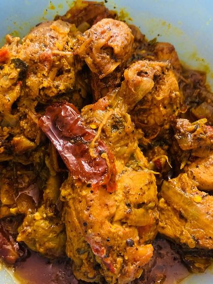 A spicy chicken curry, perfect to be eaten with some vegetable pulao.