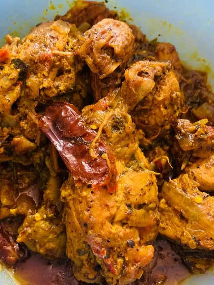 A spicy chicken curry, perfect to be eaten with some vegetable pulao.