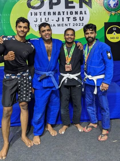 Pictures with friends and training partners at the SJJIF India Open tournament. We train together and support each other in competition.