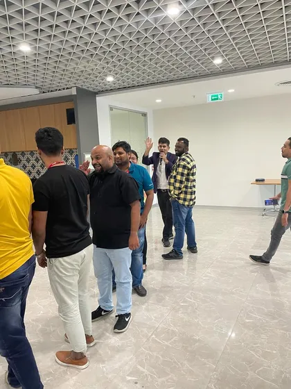 Getting the next group of participants ready for their turn. I make sure everyone gets a chance to participate and have a good time.