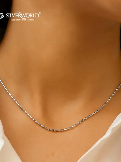 A classic, versatile silver chain that serves as the perfect foundation for any pendant or can be worn on its own for a minimalist look. This is a must-have staple in any jewelry collection.