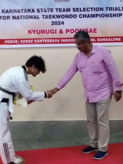 A bow of respect and gratitude after receiving his certificate at the state team selection trials.