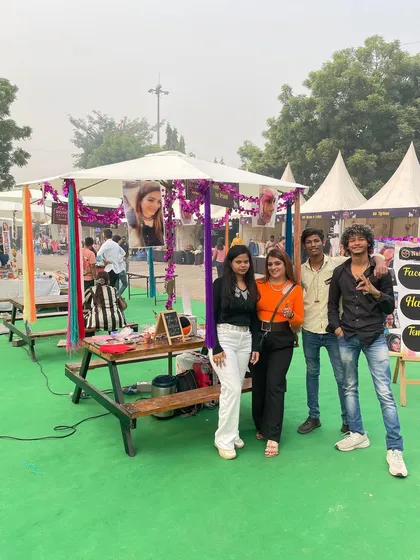 Posing with some of my talented team members at our Boho Bazaar event stall. We had a great time offering face painting and glitter art to all the lovely people who stopped by.
