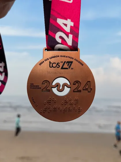 The 2024 TCS London Marathon finisher medal. A symbol of an amazing achievement, earned through months of dedicated training.