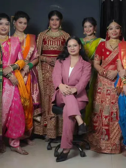 A proud moment with my students and their models, showcasing a variety of bridal looks created during our International Diploma Course.