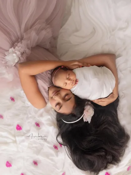 An artistic overhead portrait capturing the tender bond between two sisters. I see these moments as poetry, freezing the quiet, beautiful connection that they will share for a lifetime.