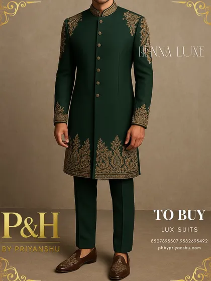 A three-quarter view of the green suit, highlighting the artistry of the hand-embroidery.