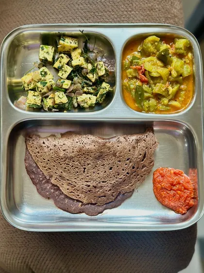 A repeat of my ragi dosa meal with sautéed paneer and mixed vegetable curry.