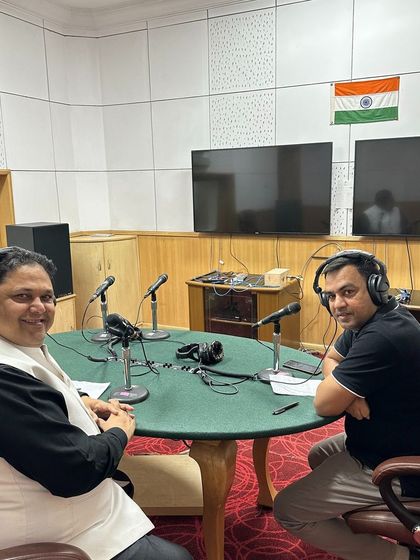 A moment with the host after a successful phone-in program on tenancy disputes. These sessions allow me to directly address the public's concerns and provide immediate, actionable legal information on rental law.