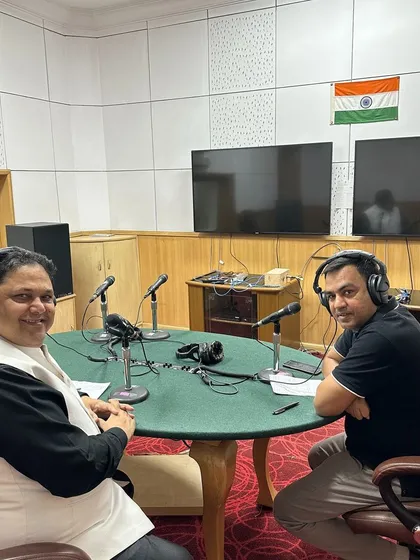 A moment with the host after a successful phone-in program on tenancy disputes. These sessions allow me to directly address the public's concerns and provide immediate, actionable legal information on rental law.