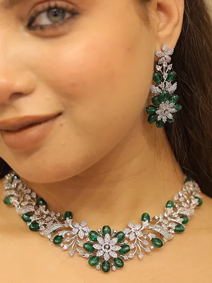 A closer look at one of our exquisite diamond-look necklaces, featuring brilliant emeralds. Our designer jewelry rental service allows you to wear breathtaking pieces like this for your special day without the lifetime investment.
