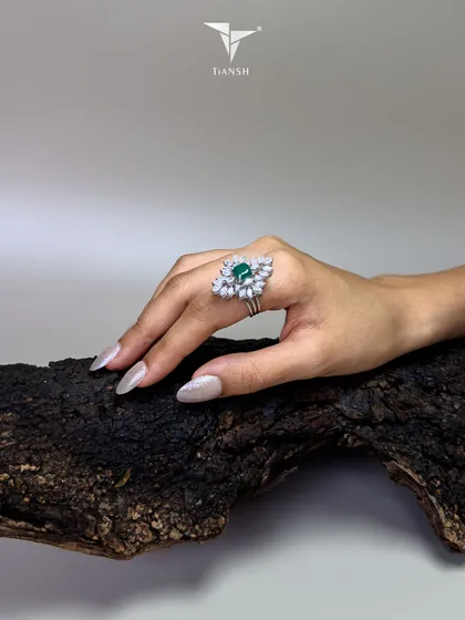 This ring captures nature’s quiet power. The deep green of the emerald is framed by diamonds that unfold like petals, creating a piece from my Whispers of the Earth collection that is born to stand out.