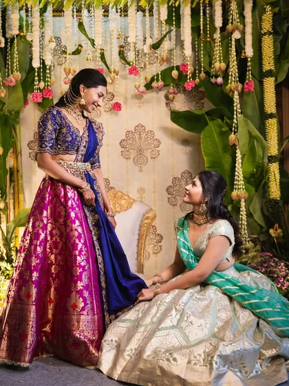 For our bride Sindhu, an architect with a clear vision, we designed this custom pellikuthuru backdrop. Drawing inspiration from a peacock's posture, we used traditional motifs and rich colors to create a gorgeous setting that complemented her outfit perfectly.