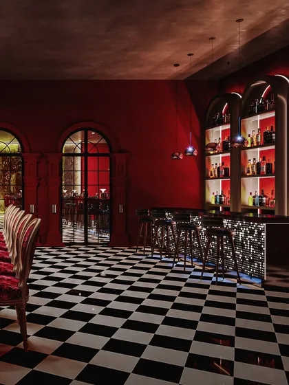 The main bar area, with its backlit shelves and sparkling mosaic-tiled front, is the focus of this vibrant render.