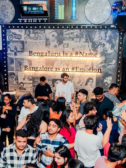 The DJ booth is part of the crowd at Bombay Adda. I love this intimate and high-energy setup.