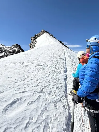 Climbers on the final summit ridge of Kang Yatse II (6,250m). This popular 6000m peak in Ladakh offers stunning views and is an excellent first step into high-altitude mountaineering.