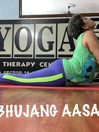 Bhujangasana, or Cobra Pose. This is a foundational backbend that strengthens the spine and opens the chest.