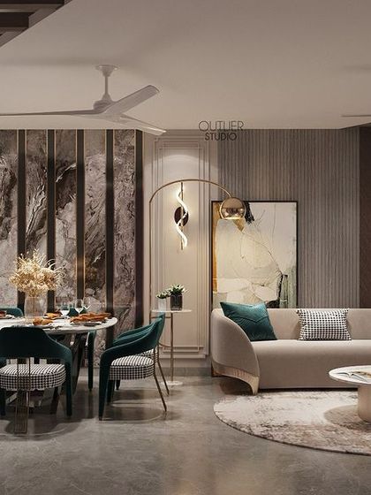 Meals and memories are made here. This dining room is magnificent in every sense, with elegant teal chairs, a modern art piece, and sculptural wall sconces that create a beautiful and inviting atmosphere.