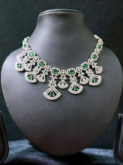 An elegant emerald-green American Diamond set, featuring a classic design that is perfect for both brides and wedding guests.