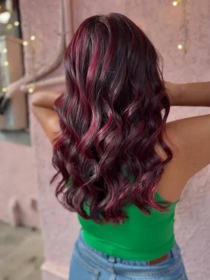 A beautiful Valentine's Day red. This rich, romantic red was created without bleach, giving the hair a beautiful, healthy shine.