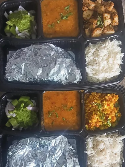 A look at two of my popular thali combinations. One with jeera aloo and the other with paneer bhurji, both served with a comforting yellow dal.