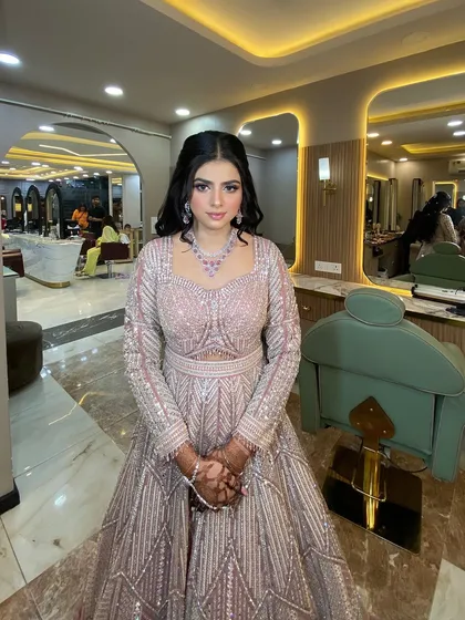 A beautiful and cute engagement bride in a lovely pink gown.