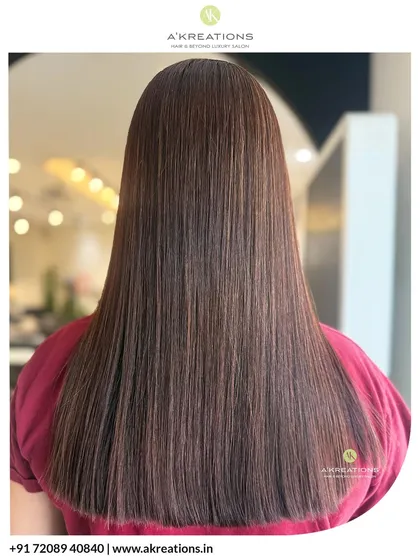 A similar view showing the light catching the sleek surface of the hair, highlighting its glass-like shine after a treatment.