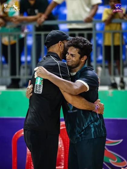 A moment of shared joy and relief between two members of our coaching staff.