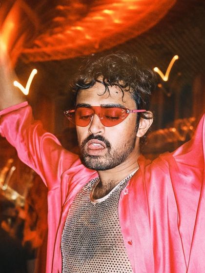 A portrait of DJ Rubot of Occupy the Disco. My curation involves bringing in guest DJs from different collectives to foster a broader sense of community in queer nightlife.