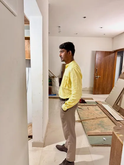 Taking a moment to visualize the final design during a site visit. This is an empty canvas that we will soon transform.