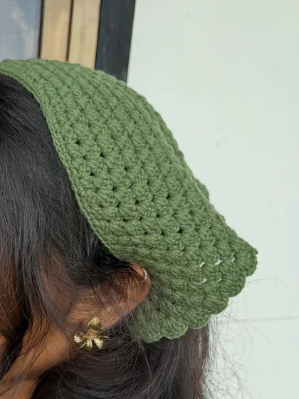 A side profile showing how the boho bandana sits. It’s a versatile piece that can be worn as a headband or to cover your hair.