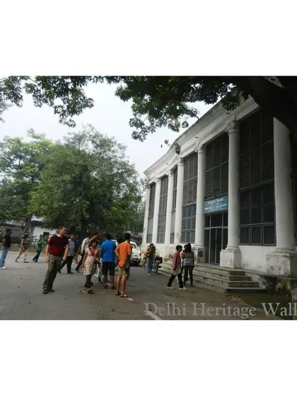 A view of the library's facade with its prominent colonial-era columns. The building is a fascinating blend of Mughal and British architectural styles.