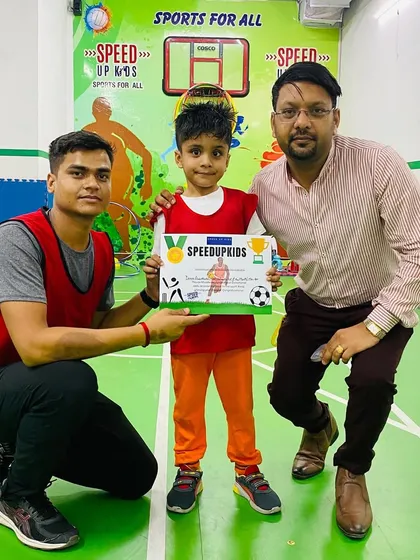 Daksh Aggarwal, our 'Most Valuable Kid' for March and April, posing with his father and coach. Congratulations, Daksh.