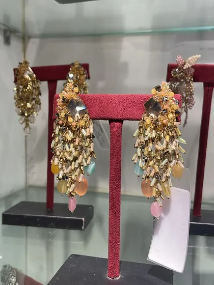 A glimpse of our multi-stone danglers on display. These earrings feature a mix of neutral tones with pops of pastel.