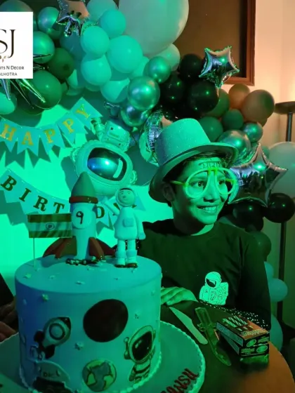 An out-of-this-world Astronaut-themed birthday party for Saraansh in GK-1, Delhi, complete with a themed cake and glow-in-the-dark props.