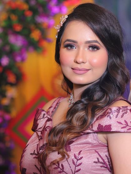 A close-up of Pihu's engagement makeup. The soft matte lipstick and defined eyes create a look that is both modern and timeless.