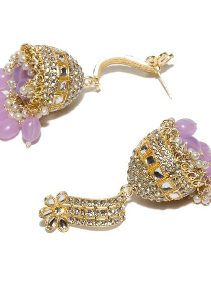 Another angle of the lavender kundan jhumkas, showing the intricate stone work and the secure post-back closure.