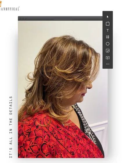 A side view of the layered cut, styled to perfection to show off the volume and face-framing shape.